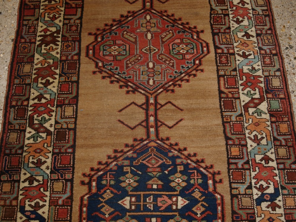 ANTIQUE PERSIAN SARAB RUNNER, CAMEL GROUND WITH GOOD COLOUR, CIRCA 1900. View VIII