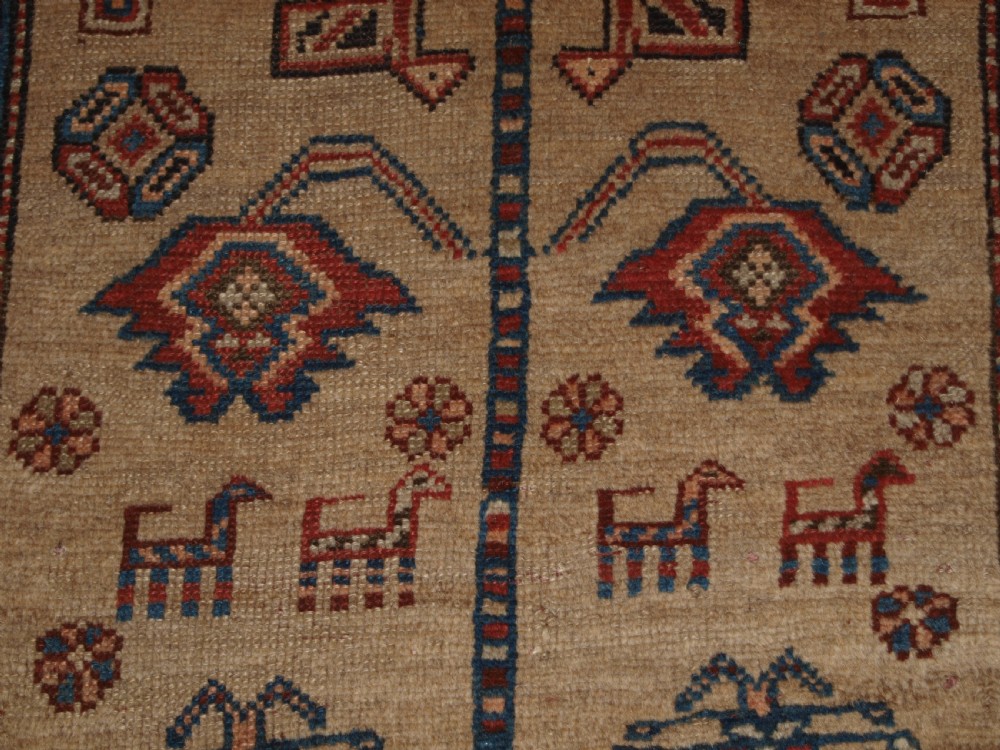 ANTIQUE NORTH WEST PERSIAN KURDISH RUNNER, CAMEL GROUND, LOTS OF ANIMALS, CIRCA 1900. View VIII
