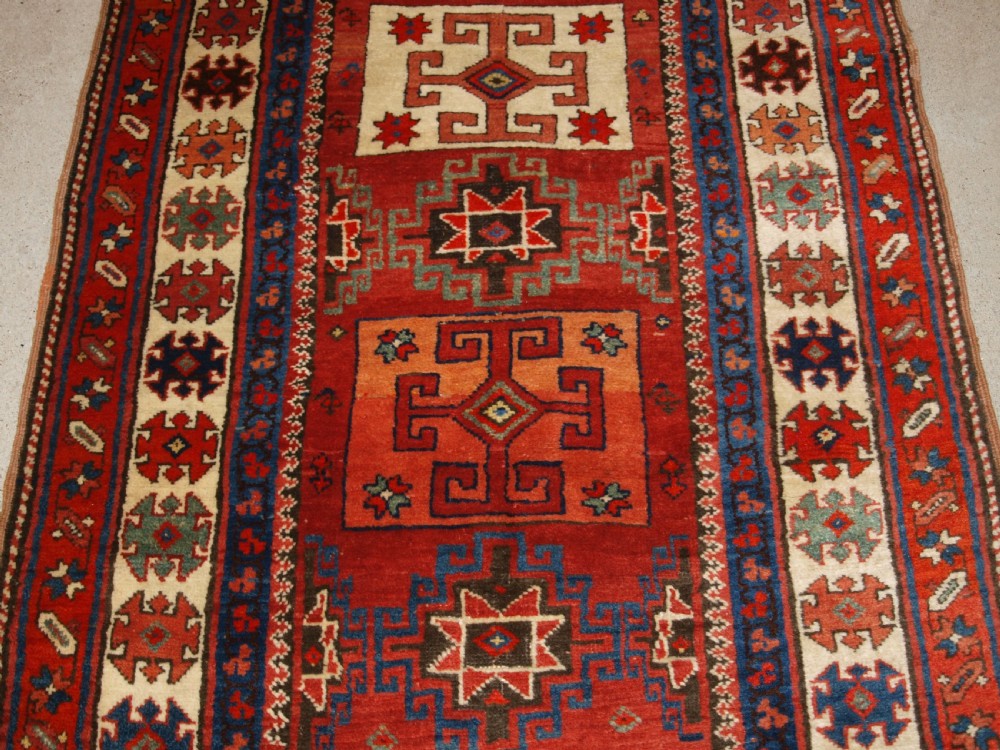 ANTIQUE NORTH PERSIAN KURDISH RUNNER WITH BOXED MEDALLION DESIGN, CIRCA 1900. View IV