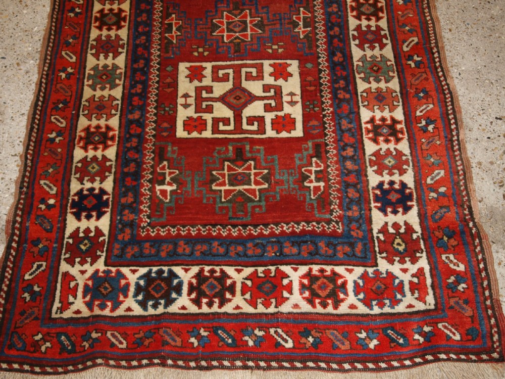 ANTIQUE NORTH PERSIAN KURDISH RUNNER WITH BOXED MEDALLION DESIGN, CIRCA 1900. View V