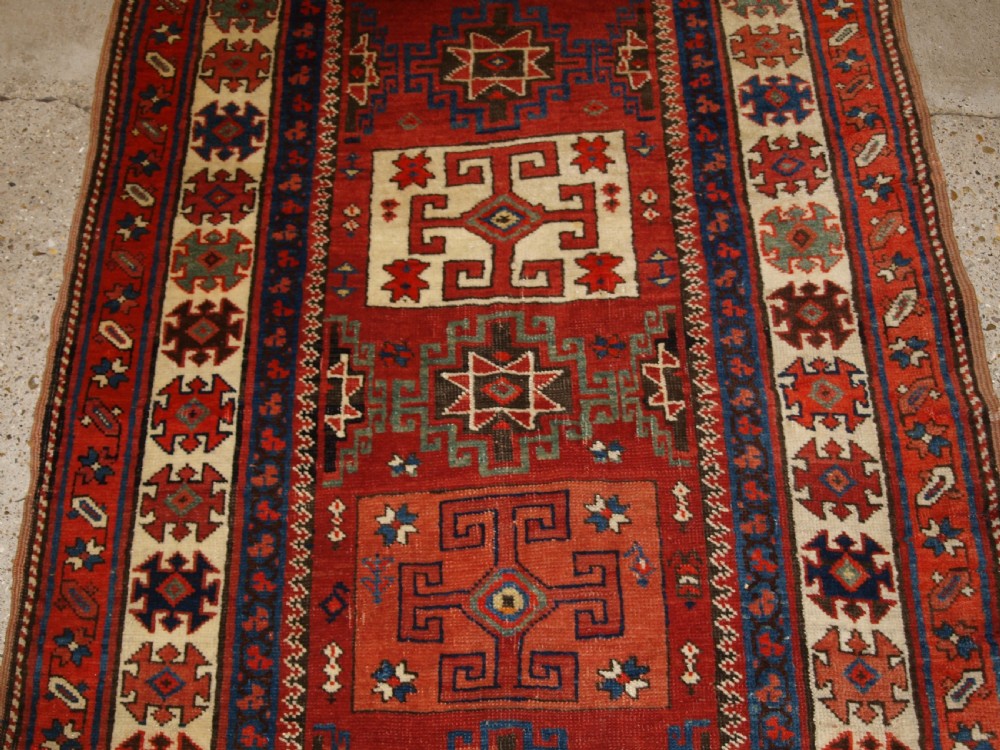 ANTIQUE NORTH PERSIAN KURDISH RUNNER WITH BOXED MEDALLION DESIGN, CIRCA 1900. View VI