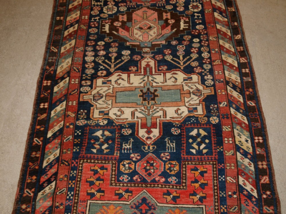 ANTIQUE SOUTH EAST CAUCASIAN RUNNER, SOFT COLOURS, PEOPLE AND ANIMALS, CIRCA 1900. View III