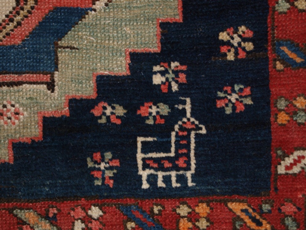 ANTIQUE SOUTH EAST CAUCASIAN RUNNER, SOFT COLOURS, PEOPLE AND ANIMALS, CIRCA 1900. View VII