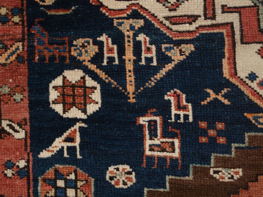 ANTIQUE SOUTH EAST CAUCASIAN RUNNER, SOFT COLOURS, PEOPLE AND ANIMALS, CIRCA 1900. View IX