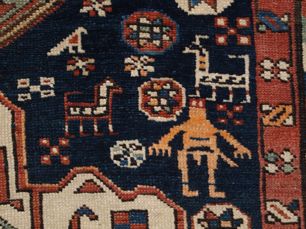 ANTIQUE SOUTH EAST CAUCASIAN RUNNER, SOFT COLOURS, PEOPLE AND ANIMALS, CIRCA 1900. View X