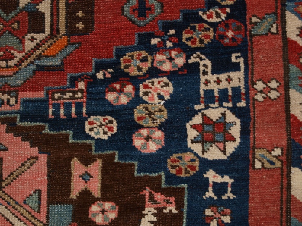 ANTIQUE SOUTH EAST CAUCASIAN RUNNER, SOFT COLOURS, PEOPLE AND ANIMALS, CIRCA 1900. View XI