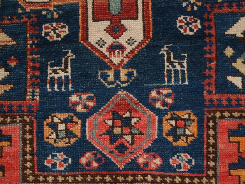 ANTIQUE SOUTH EAST CAUCASIAN RUNNER, SOFT COLOURS, PEOPLE AND ANIMALS, CIRCA 1900. View XII