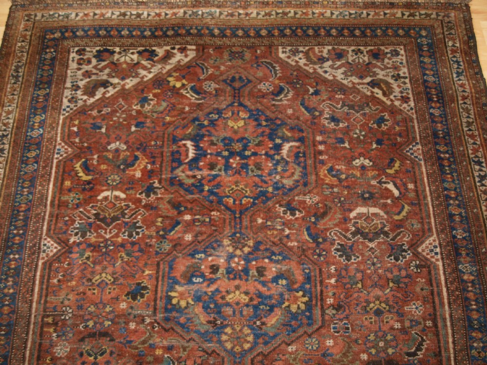 ANTIQUE SOUTH WEST PERSIAN RUG BY THE KHAMSEH TRIBE, BAHARLU SUB TRIBE, CIRCA 1890. View V