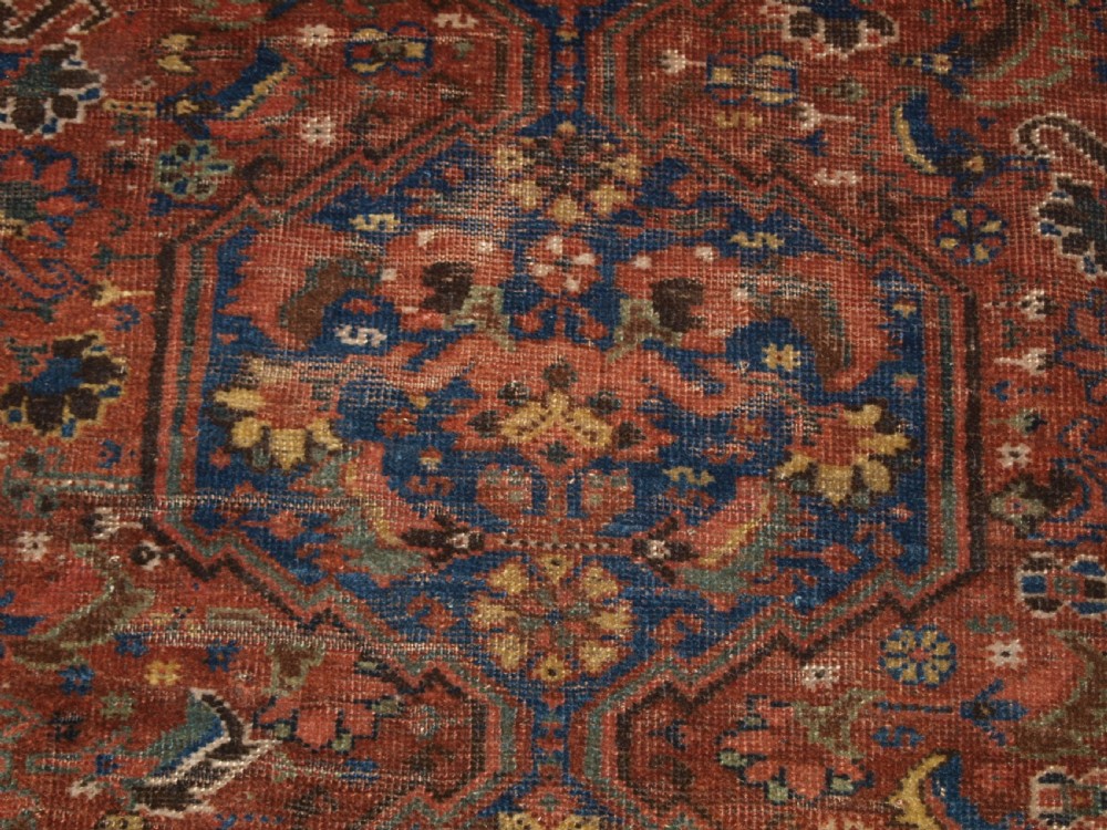 ANTIQUE SOUTH WEST PERSIAN RUG BY THE KHAMSEH TRIBE, BAHARLU SUB TRIBE, CIRCA 1890. View X
