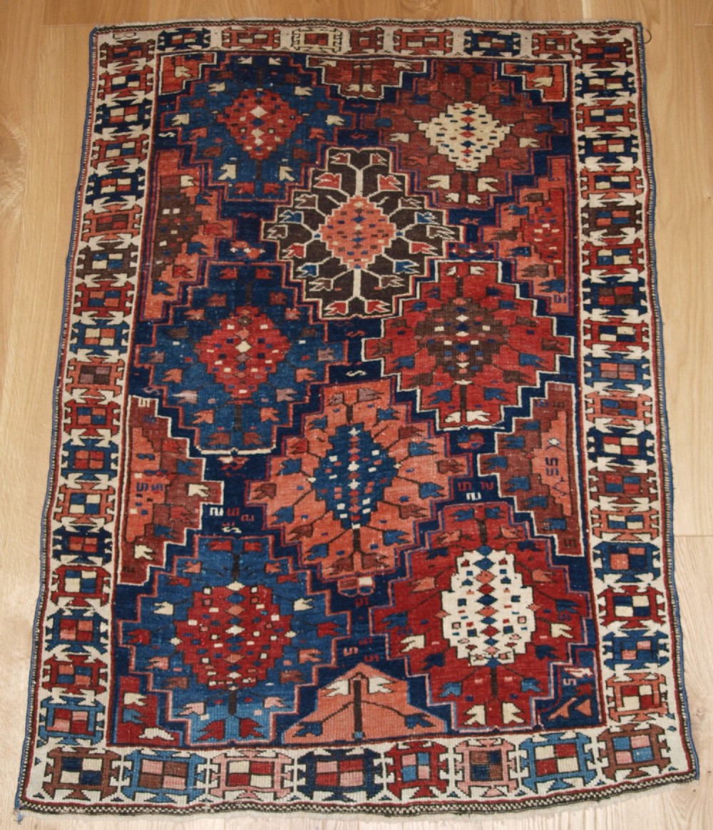 ANTIQUE CAUCASIAN RUG OF SMALL SIZE AND SCARCE DESIGN, KUBA REGION, LATE 19TH CENTURY.