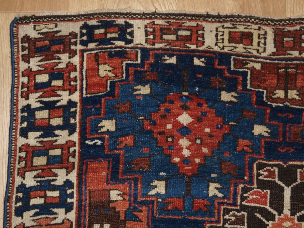 ANTIQUE CAUCASIAN RUG OF SMALL SIZE AND SCARCE DESIGN, KUBA REGION, LATE 19TH CENTURY. View II