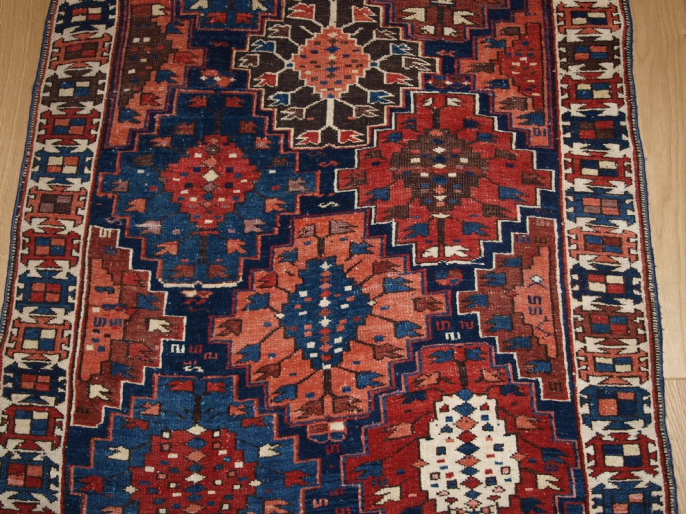 ANTIQUE CAUCASIAN RUG OF SMALL SIZE AND SCARCE DESIGN, KUBA REGION, LATE 19TH CENTURY. View IV