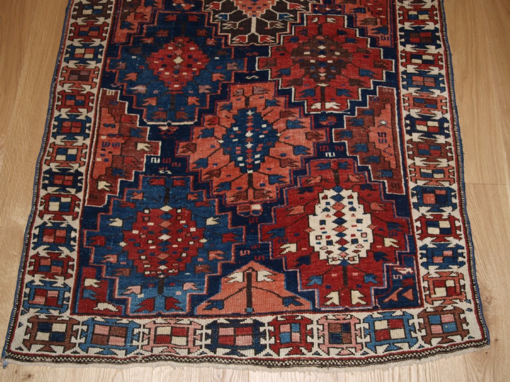 ANTIQUE CAUCASIAN RUG OF SMALL SIZE AND SCARCE DESIGN, KUBA REGION, LATE 19TH CENTURY. View V