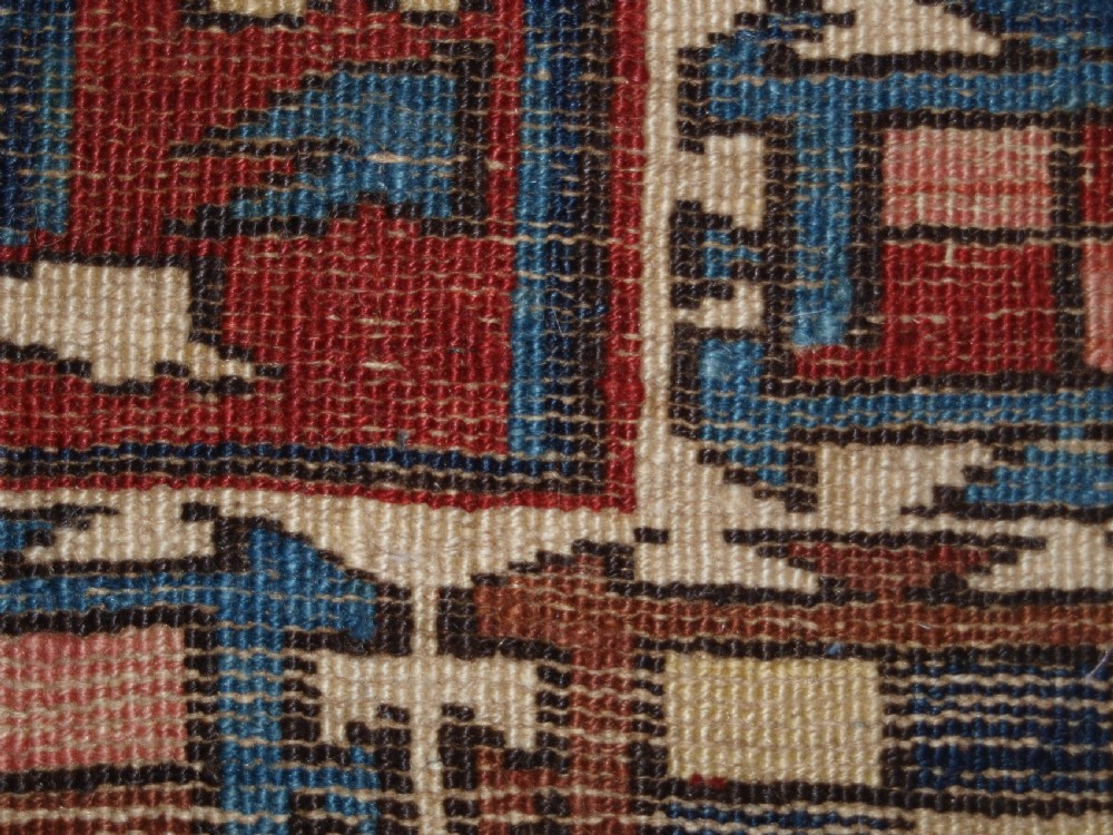 ANTIQUE CAUCASIAN RUG OF SMALL SIZE AND SCARCE DESIGN, KUBA REGION, LATE 19TH CENTURY. View X