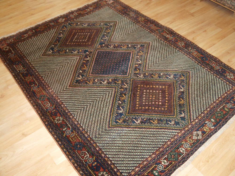 OLD KHAMSEH RUG, TRIPLE MEDALLION WITH BIRDS, CIRCA 1920. View II