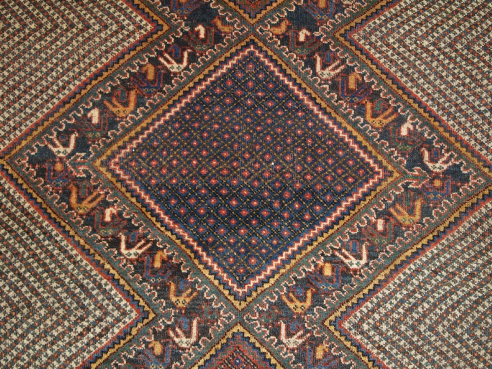 OLD KHAMSEH RUG, TRIPLE MEDALLION WITH BIRDS, CIRCA 1920. View VIII
