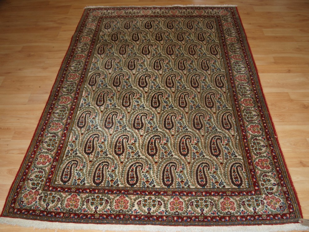 OLD QUM RUG WITH ALL OVER BOTEH DESIGN, EXCELLENT CONDITION, CIRCA 1920.