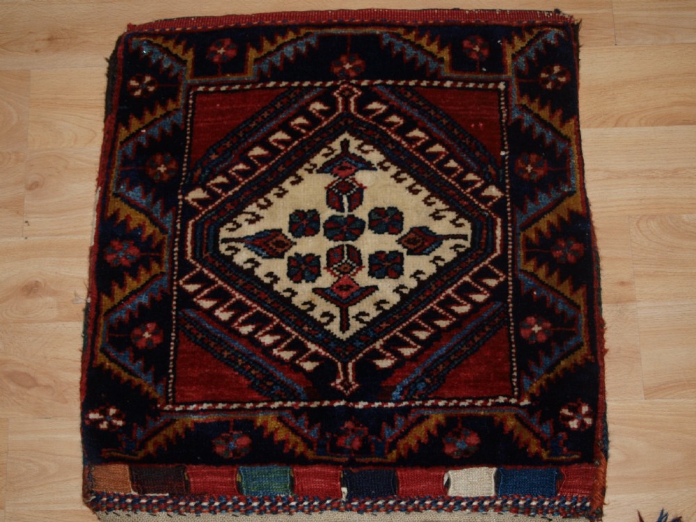 ANTIQUE COMPLETE LURI FARS REGION KHORJIN SADDLE BAGS WITH PLAIN WEAVE BACK, CIRCA 1900/20. View II