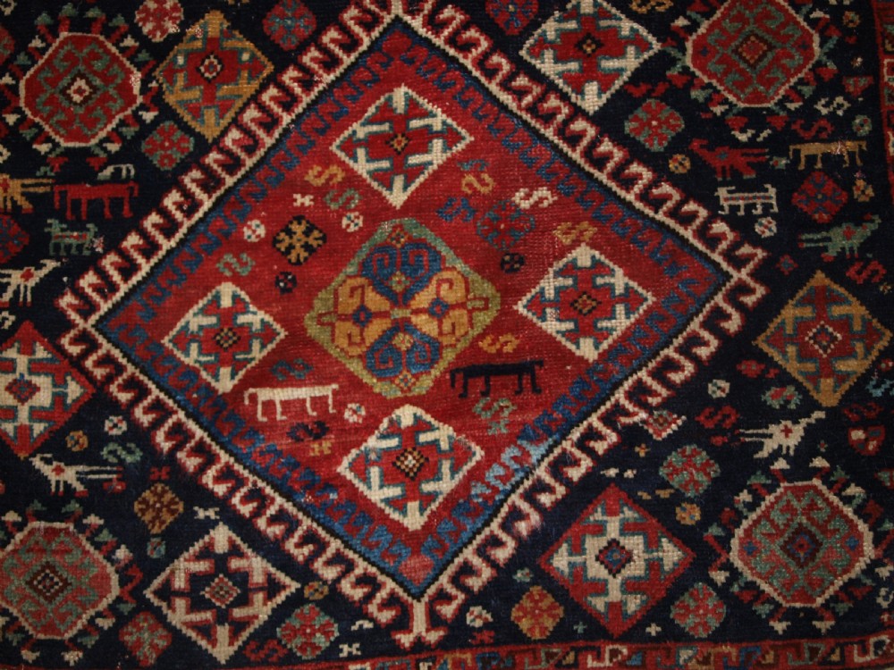 ANTIQUE COMPLETE QASHQAI KHORJIN SADDLE BAGS OF LARGE SIZE WITH PLAIN WEAVE BACK, CIRCA 1900. View VI