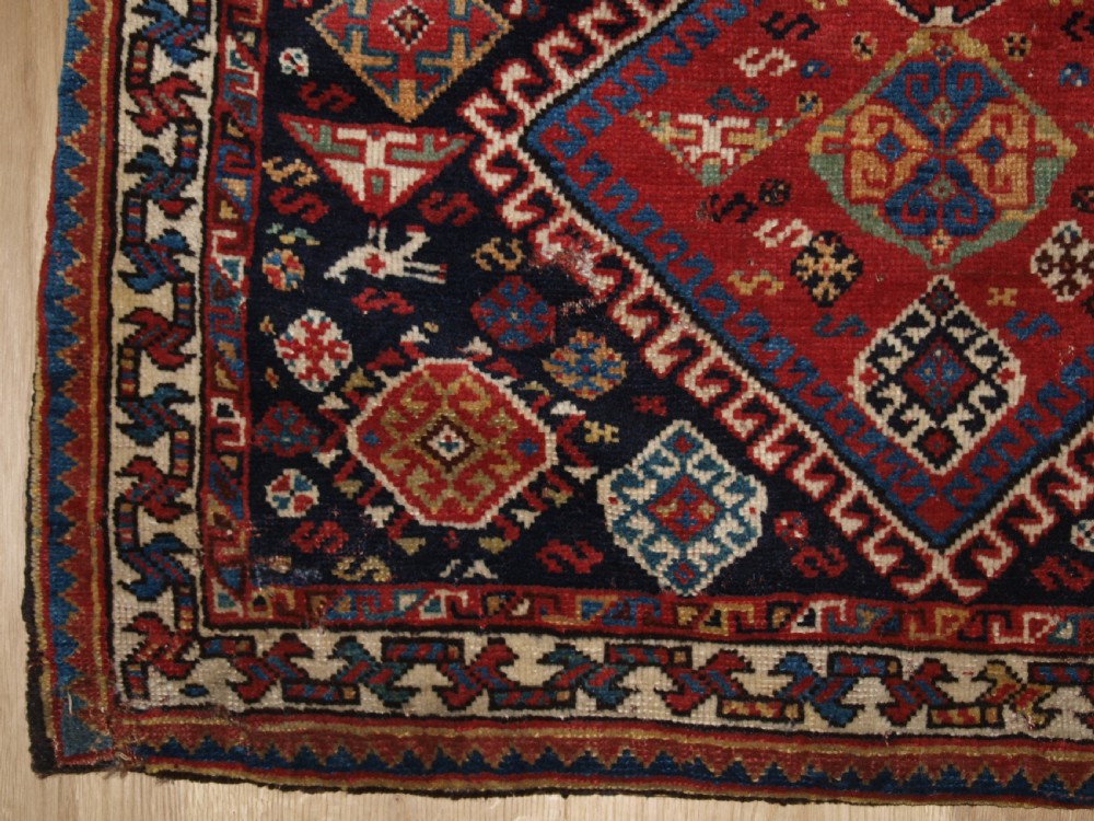 ANTIQUE COMPLETE QASHQAI KHORJIN SADDLE BAGS OF LARGE SIZE WITH PLAIN WEAVE BACK, CIRCA 1900. View VIII