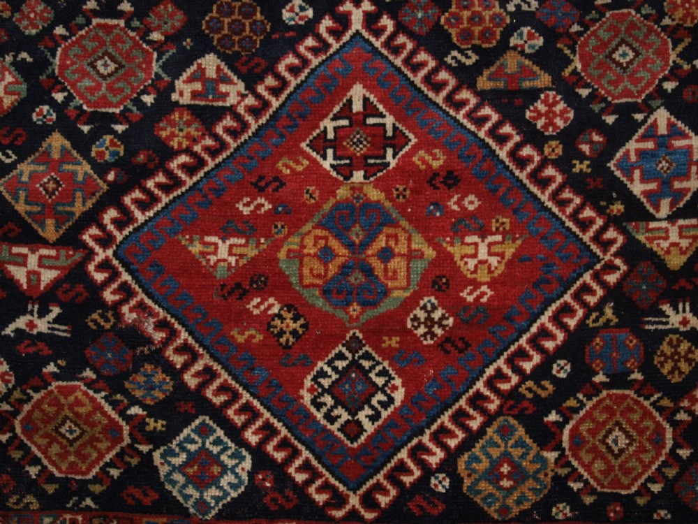 ANTIQUE COMPLETE QASHQAI KHORJIN SADDLE BAGS OF LARGE SIZE WITH PLAIN WEAVE BACK, CIRCA 1900. View IX