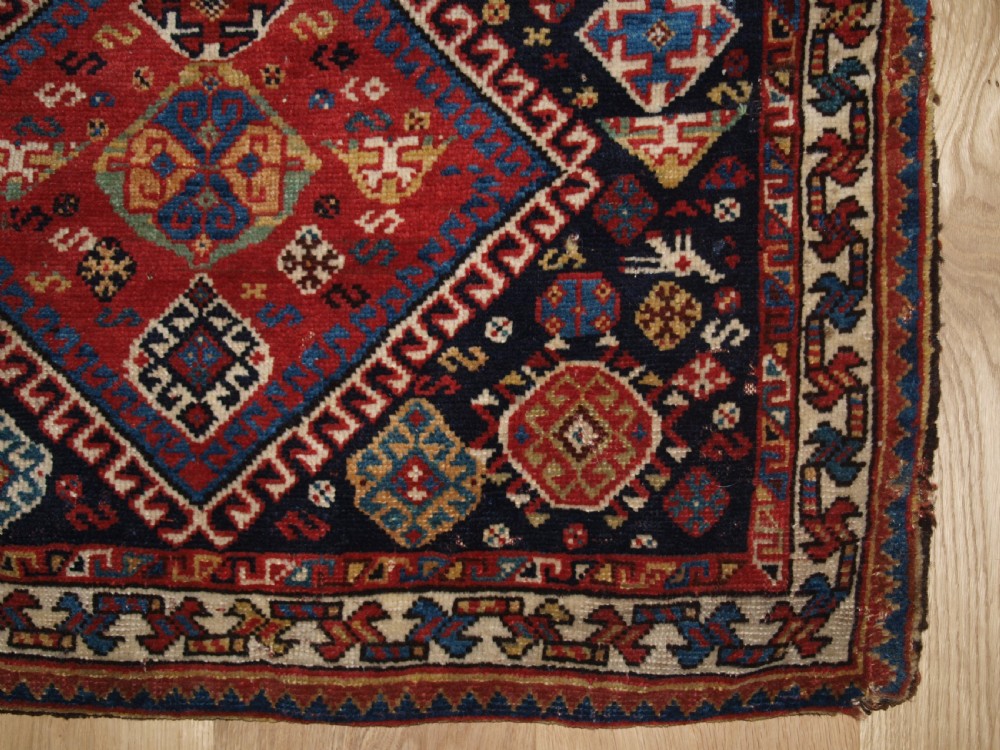 ANTIQUE COMPLETE QASHQAI KHORJIN SADDLE BAGS OF LARGE SIZE WITH PLAIN WEAVE BACK, CIRCA 1900. View X