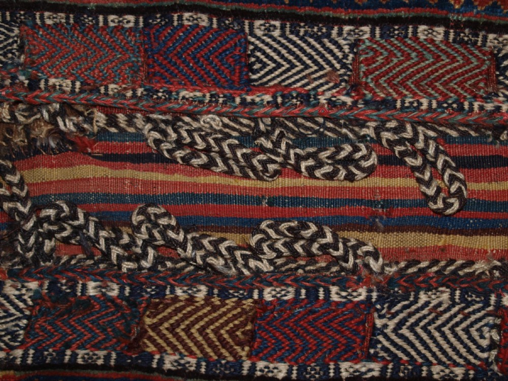 ANTIQUE COMPLETE QASHQAI KHORJIN SADDLE BAGS OF LARGE SIZE WITH PLAIN WEAVE BACK, CIRCA 1900. View XI