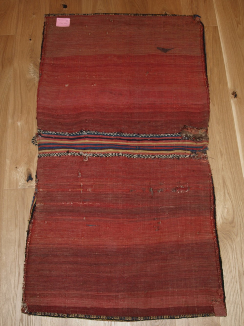 ANTIQUE COMPLETE QASHQAI KHORJIN SADDLE BAGS OF LARGE SIZE WITH PLAIN WEAVE BACK, CIRCA 1900. View XII