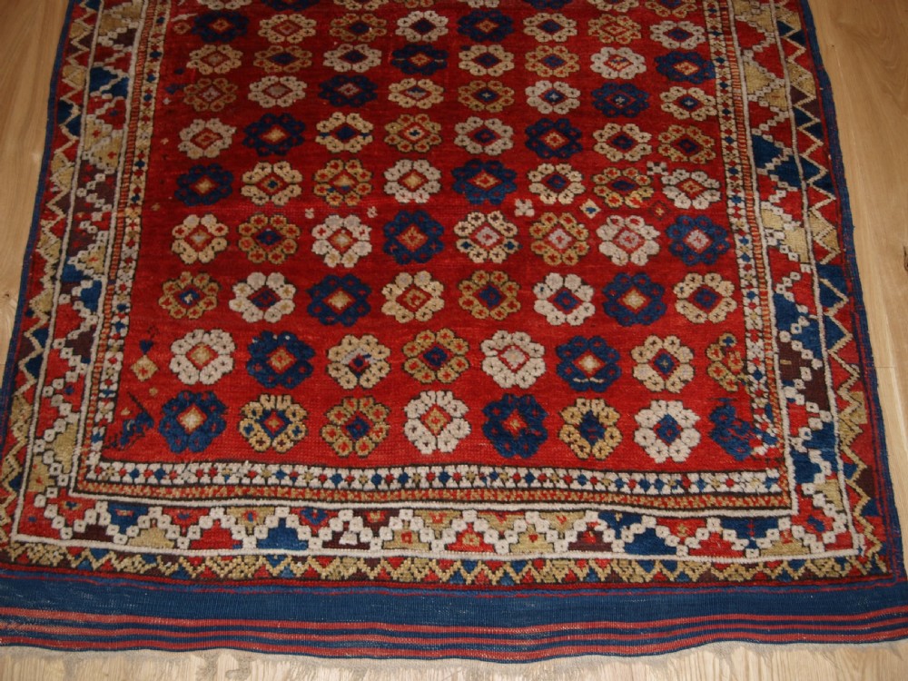 ANTIQUE TURKISH BERGAMA RUG, ALL OVER FLORAL DESIGN, 2ND HALF 19TH CENTURY. View IV