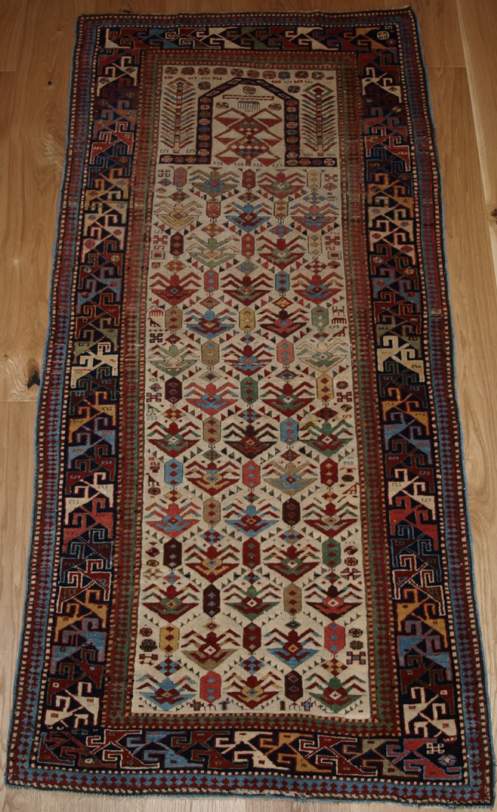 ANTIQUE CAUCASIAN AKSTAFA PRAYER RUG, IVORY GROUND WITH SUPERB COLOUR, 2ND HALF 19TH CENTURY.