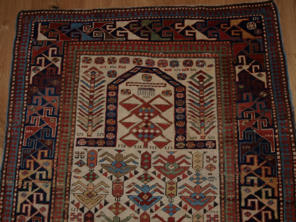 ANTIQUE CAUCASIAN AKSTAFA PRAYER RUG, IVORY GROUND WITH SUPERB COLOUR, 2ND HALF 19TH CENTURY. View IV