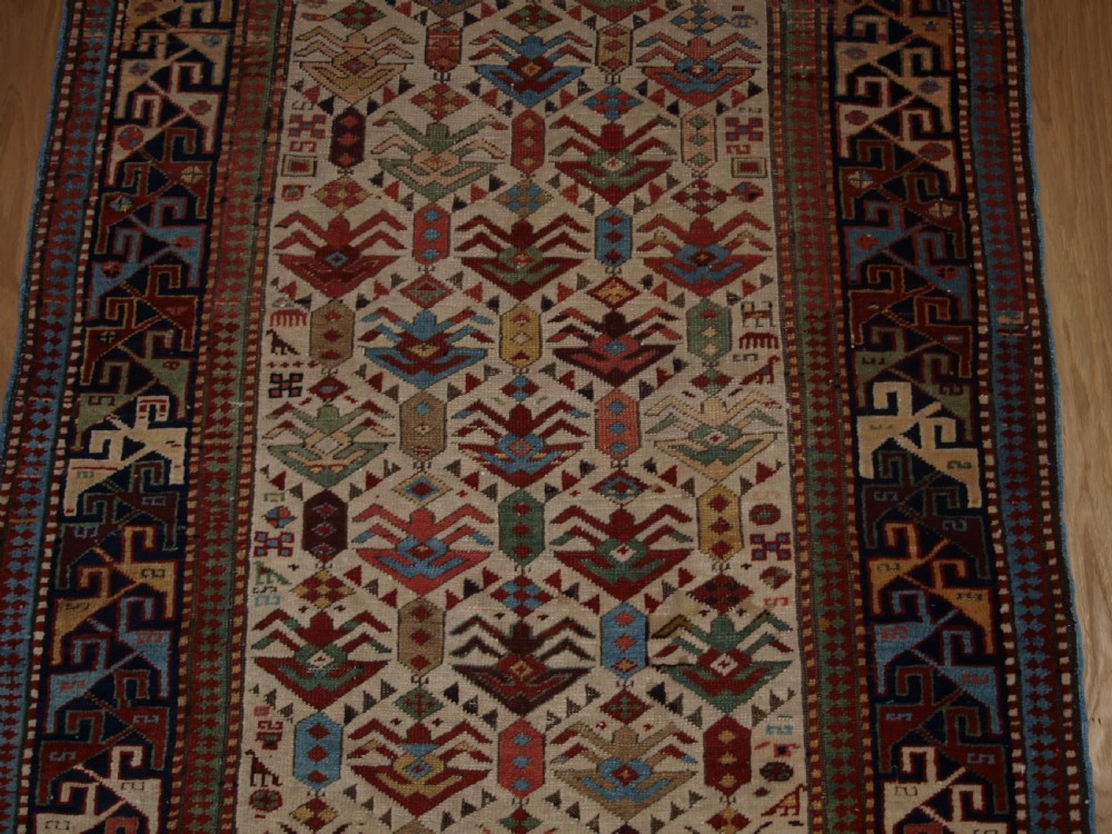 ANTIQUE CAUCASIAN AKSTAFA PRAYER RUG, IVORY GROUND WITH SUPERB COLOUR, 2ND HALF 19TH CENTURY. View V
