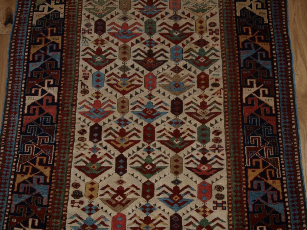 ANTIQUE CAUCASIAN AKSTAFA PRAYER RUG, IVORY GROUND WITH SUPERB COLOUR, 2ND HALF 19TH CENTURY. View VI