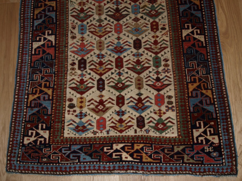 ANTIQUE CAUCASIAN AKSTAFA PRAYER RUG, IVORY GROUND WITH SUPERB COLOUR, 2ND HALF 19TH CENTURY. View VII