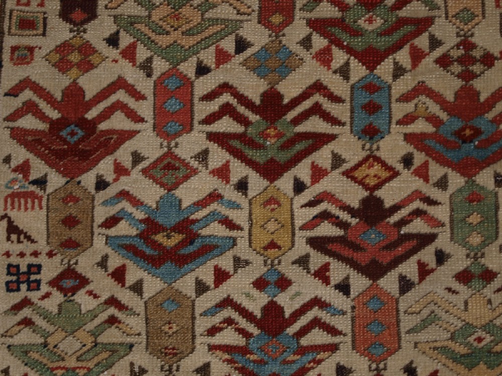 ANTIQUE CAUCASIAN AKSTAFA PRAYER RUG, IVORY GROUND WITH SUPERB COLOUR, 2ND HALF 19TH CENTURY. View IX