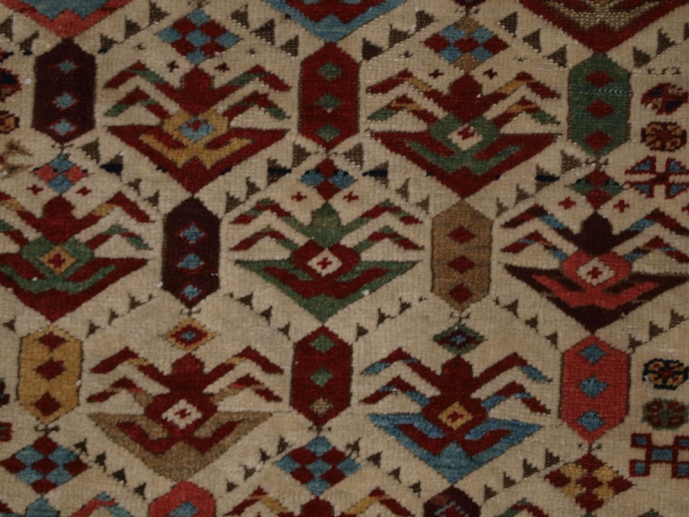 ANTIQUE CAUCASIAN AKSTAFA PRAYER RUG, IVORY GROUND WITH SUPERB COLOUR, 2ND HALF 19TH CENTURY. View X