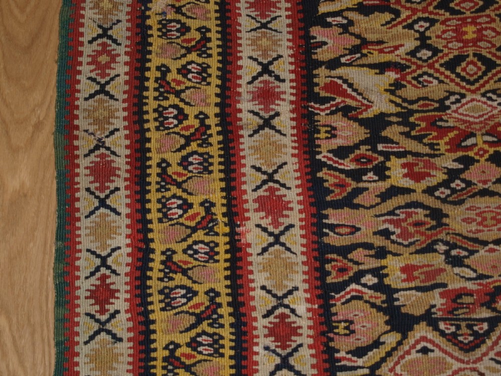 ANTIQUE SENNEH KILIM WITH MEDALLION DESIGN, SOFT COLOURS, CIRCA 1900. View VII