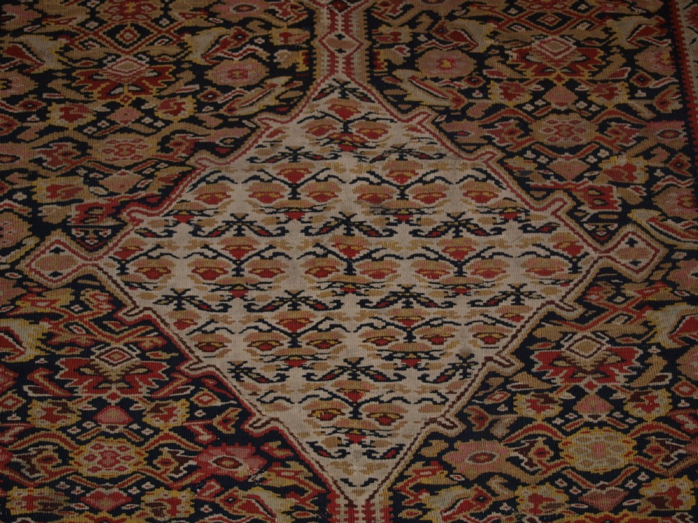 ANTIQUE SENNEH KILIM WITH MEDALLION DESIGN, SOFT COLOURS, CIRCA 1900. View IX