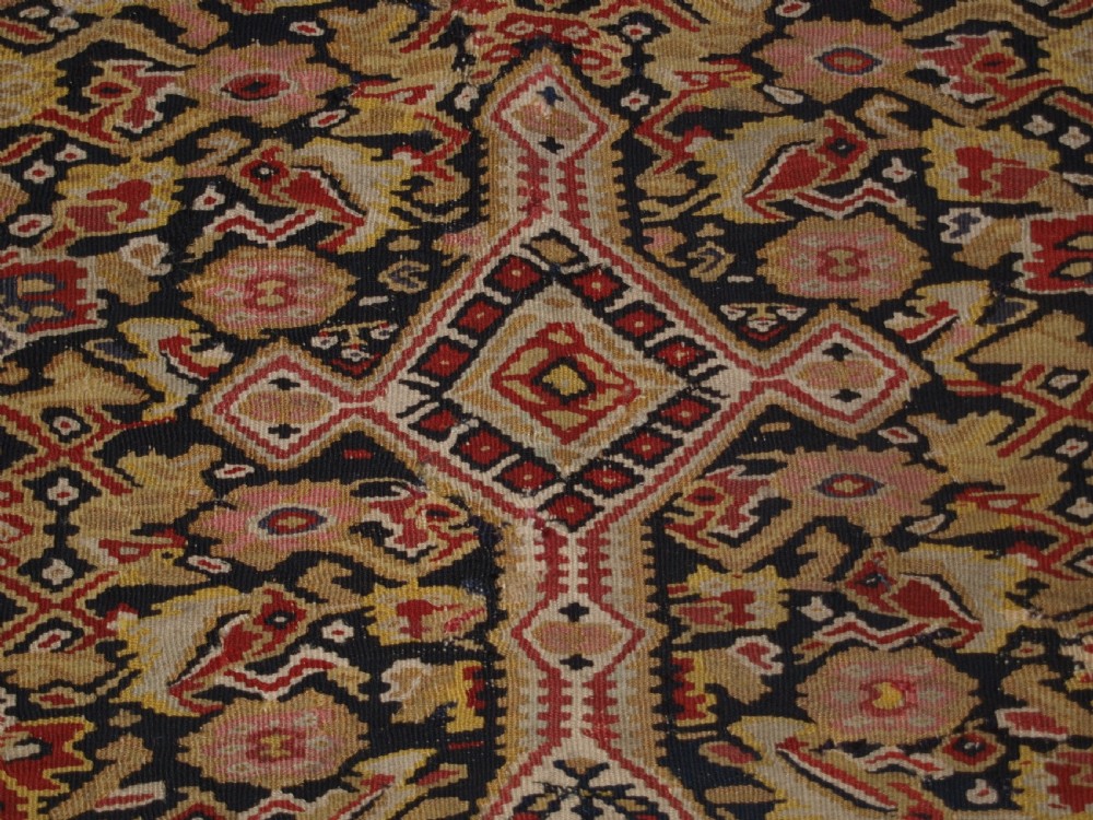 ANTIQUE SENNEH KILIM WITH MEDALLION DESIGN, SOFT COLOURS, CIRCA 1900. View X