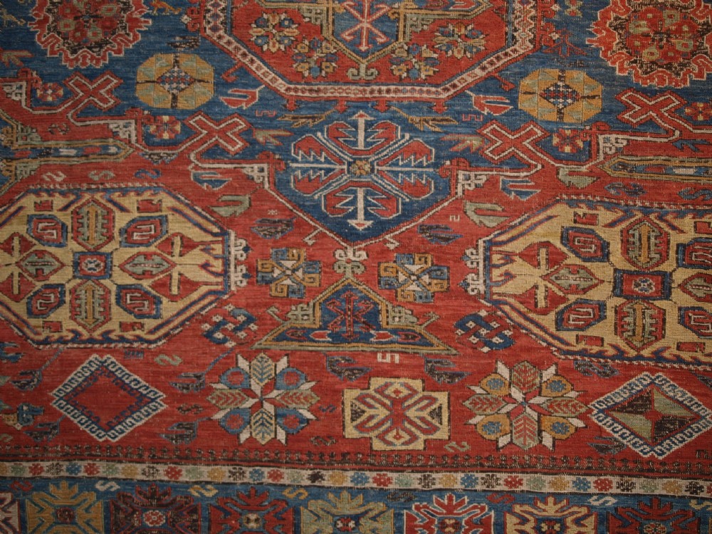 ANTIQUE CAUCASIAN THREE MEDALLION SOUMAK CARPET OF RARE DESIGN, SUPERB COLOUR, CIRCA 1880. View XI