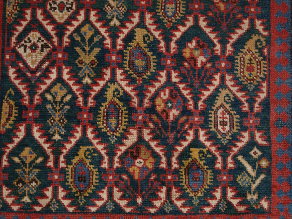 ANTIQUE CAUCASIAN DAGHESTAN RUG WITH SCARCE GREEN GROUND, LATTICE DESIGN, CIRCA 1880. View XI