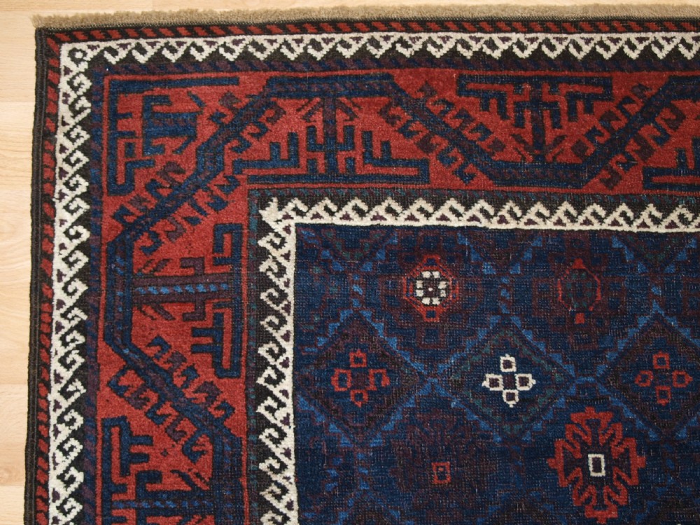 ANTIQUE BALUCH RUG WITH LATTICE DESIGN IN SUPERB BLUES, BOAT BORDER, LATE 19TH CENTURY. View III