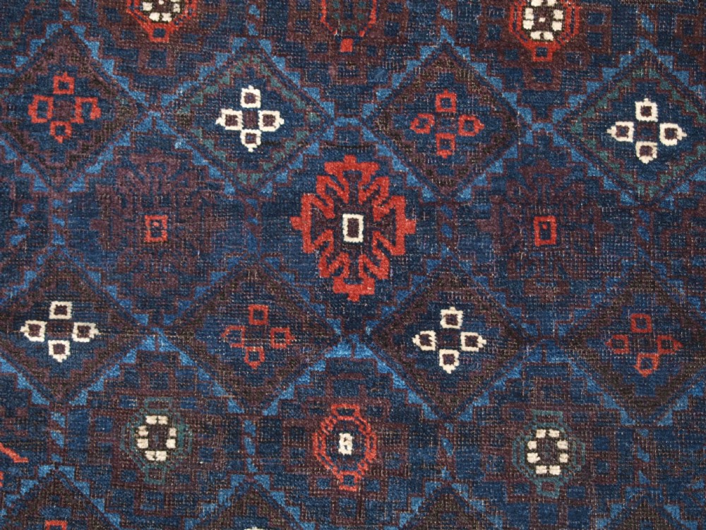 ANTIQUE BALUCH RUG WITH LATTICE DESIGN IN SUPERB BLUES, BOAT BORDER, LATE 19TH CENTURY. View X