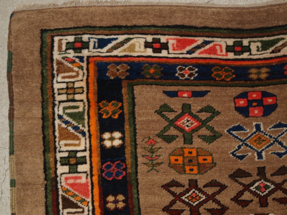 ANTIQUE SARAB RUNNER, CAMEL WOOL GROUND WITH ANIMALS, CIRCA 1900. View II