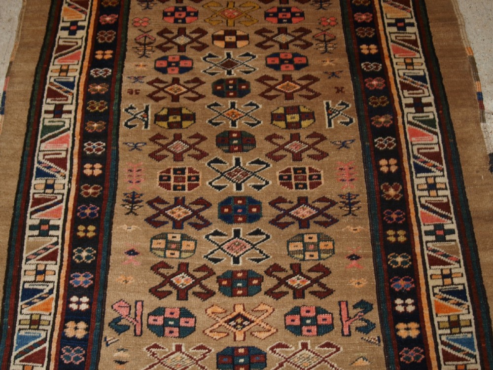 ANTIQUE SARAB RUNNER, CAMEL WOOL GROUND WITH ANIMALS, CIRCA 1900. View VI