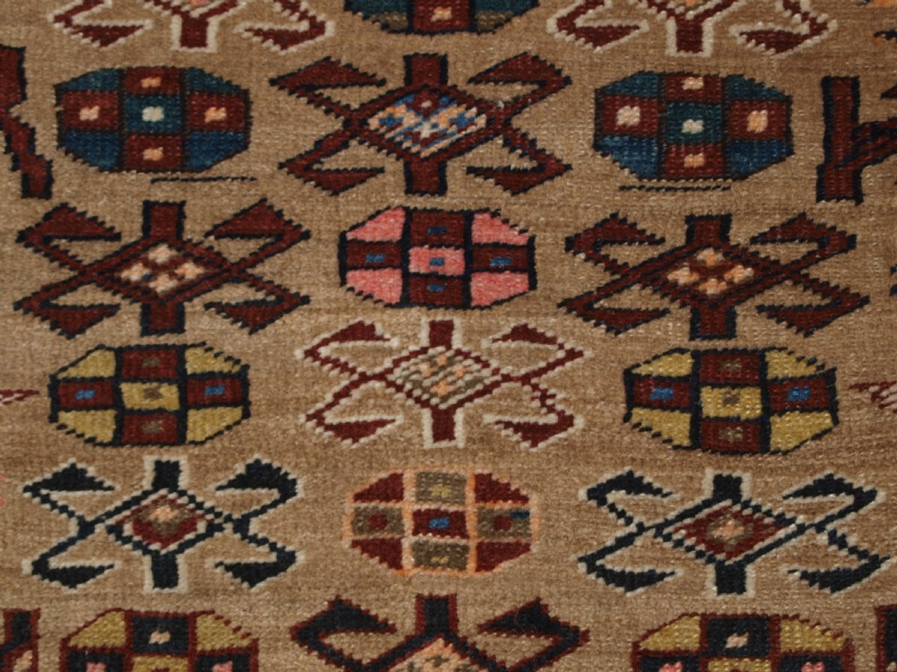 ANTIQUE SARAB RUNNER, CAMEL WOOL GROUND WITH ANIMALS, CIRCA 1900. View IX