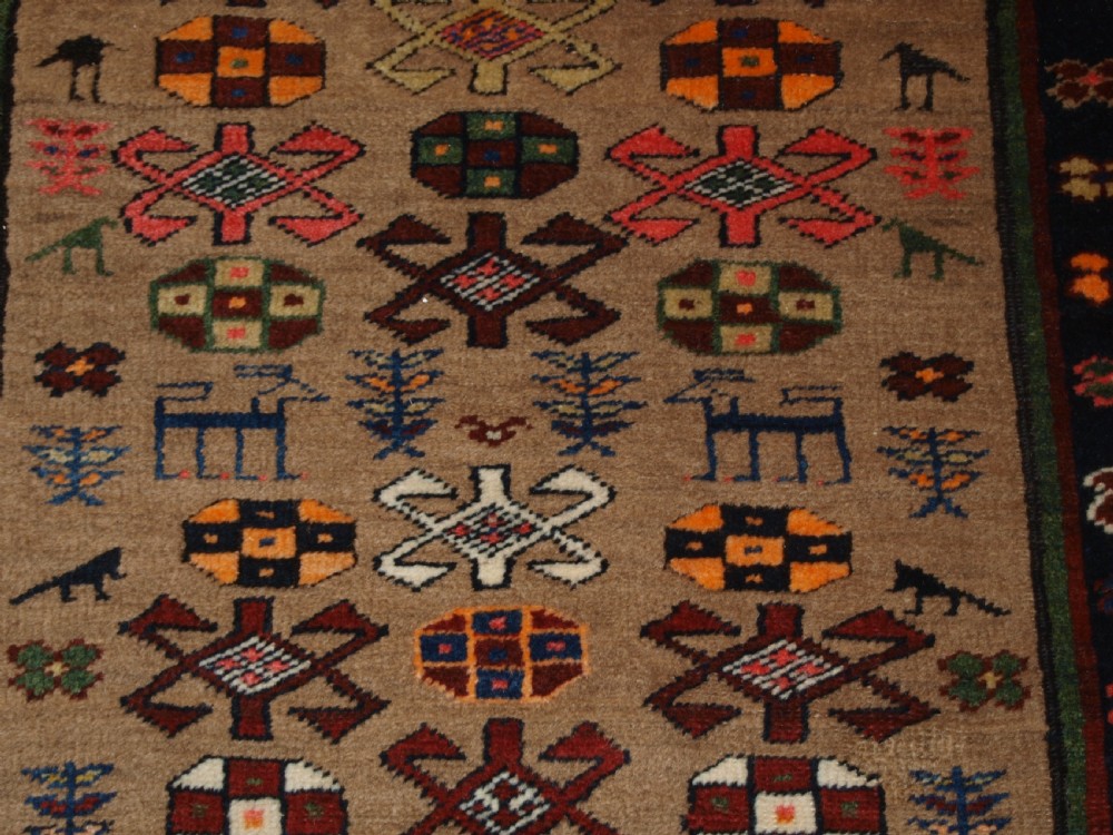 ANTIQUE SARAB RUNNER, CAMEL WOOL GROUND WITH ANIMALS, CIRCA 1900. View XII