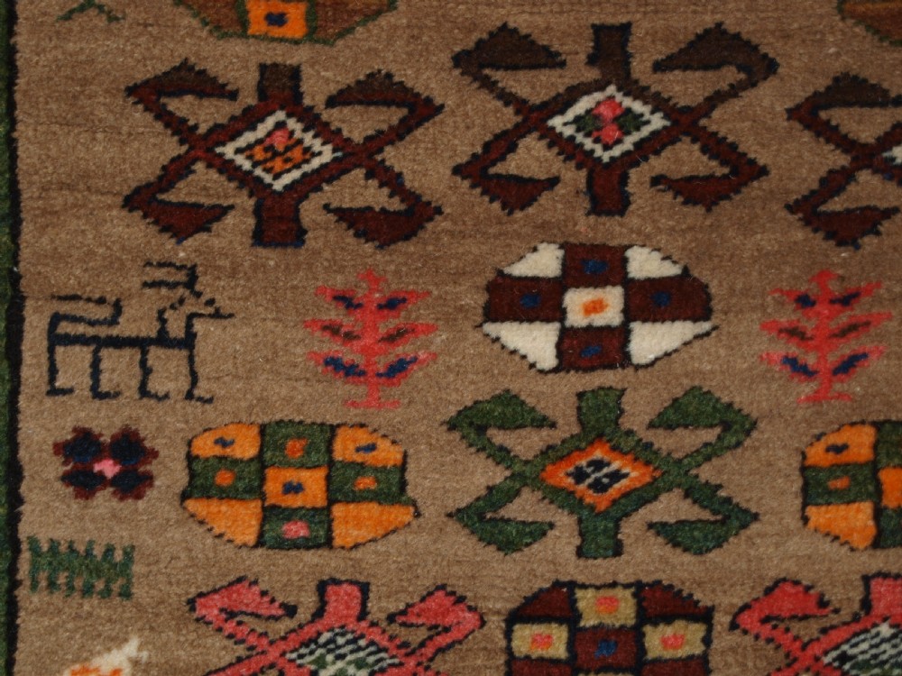 ANTIQUE SARAB RUNNER, CAMEL WOOL GROUND WITH ANIMALS, CIRCA 1900. View XIII