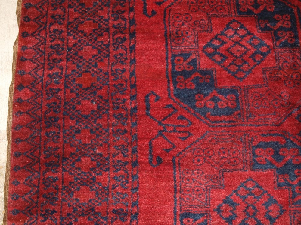 OLD AFGHAN VILLAGE CARPET, DEEP RED, ALMOST SQUARE SIZE, CIRCA 1920. View III
