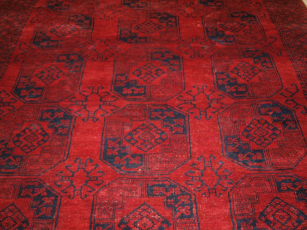 OLD AFGHAN VILLAGE CARPET, DEEP RED, ALMOST SQUARE SIZE, CIRCA 1920. View V